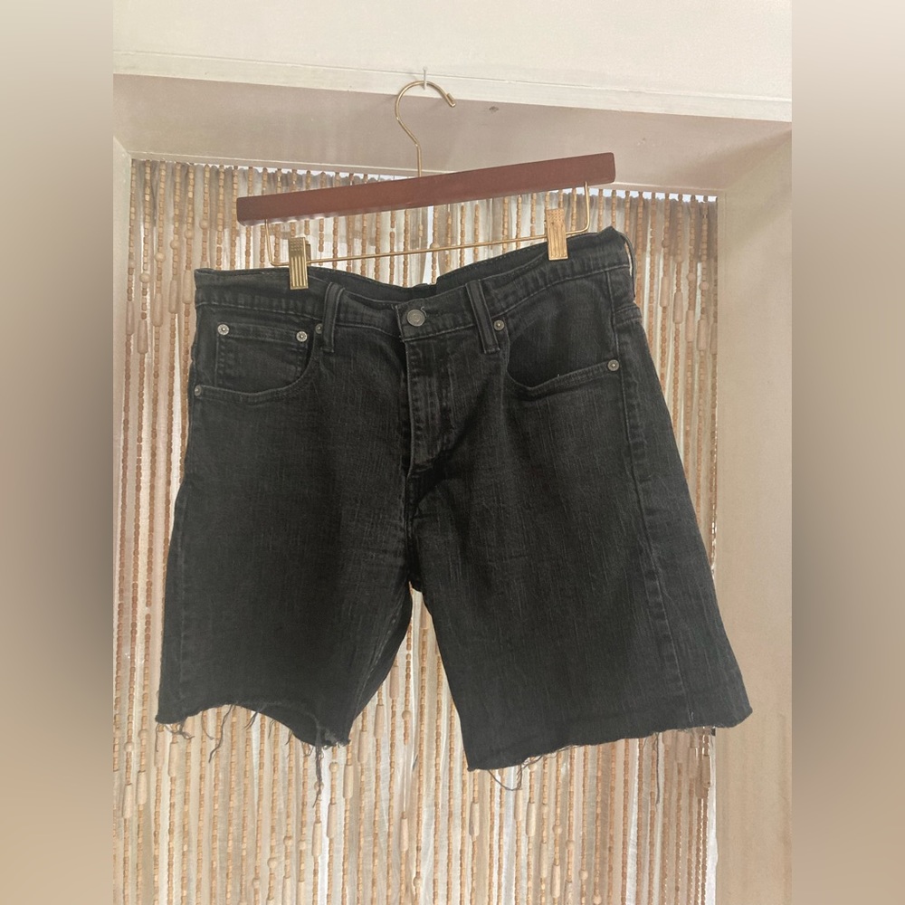 Levi black denim cutoff’s